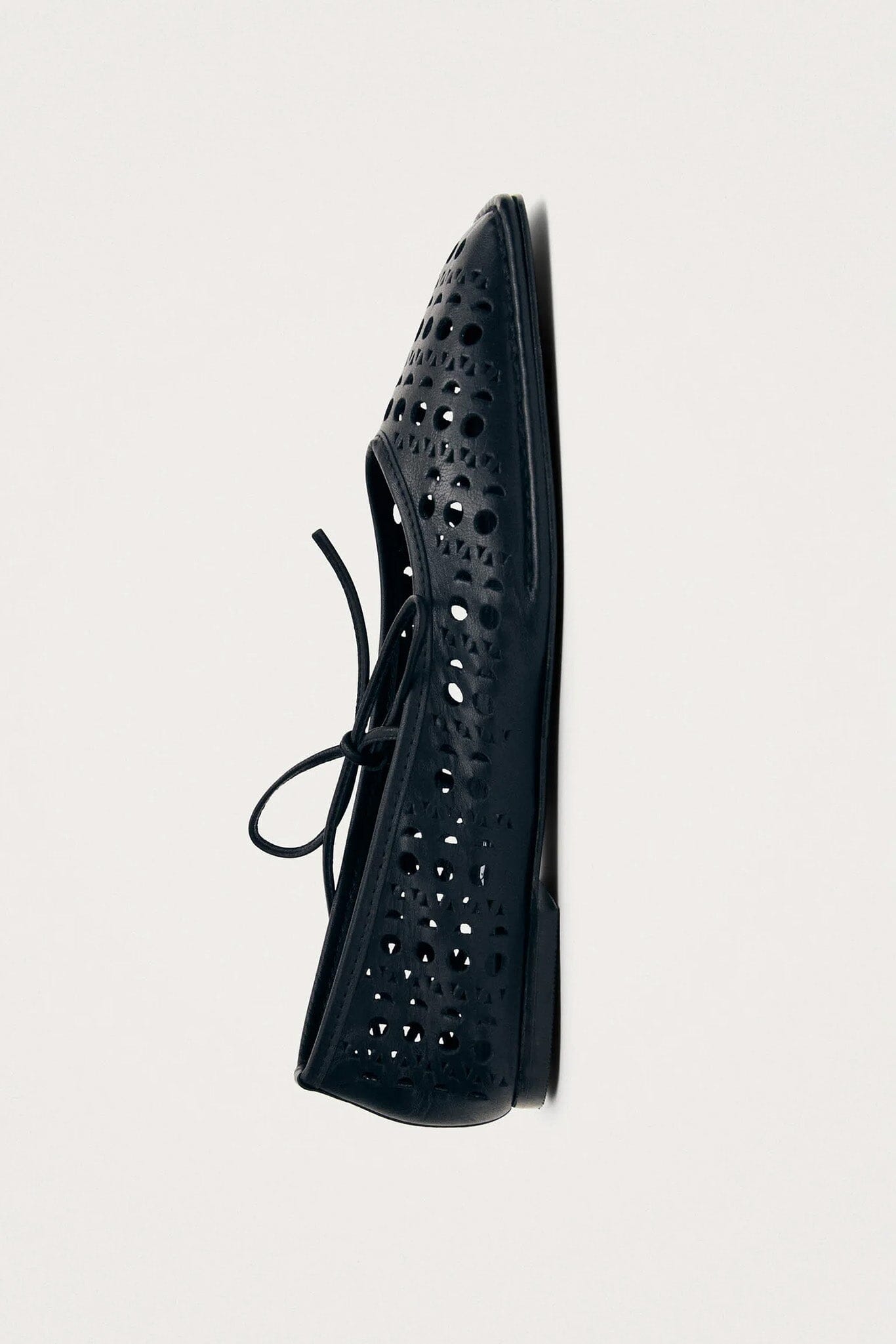 The side view of black square toe mary jane sandals