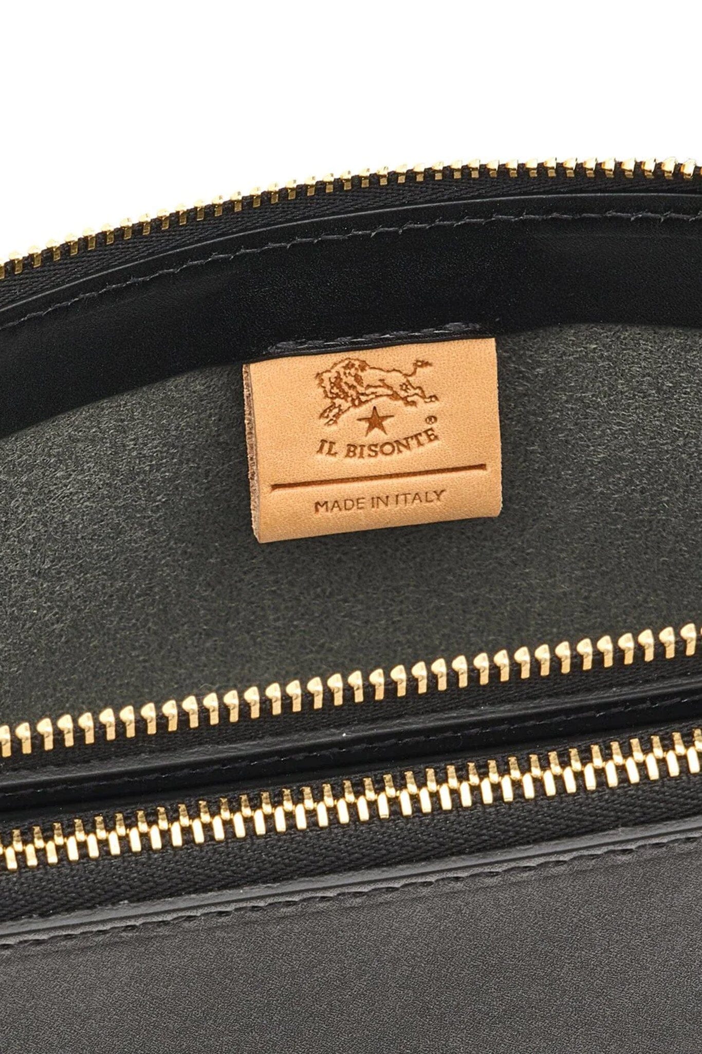 Black interior leather bag with gold zipper and 'Il Bisonte' brand label on a white background