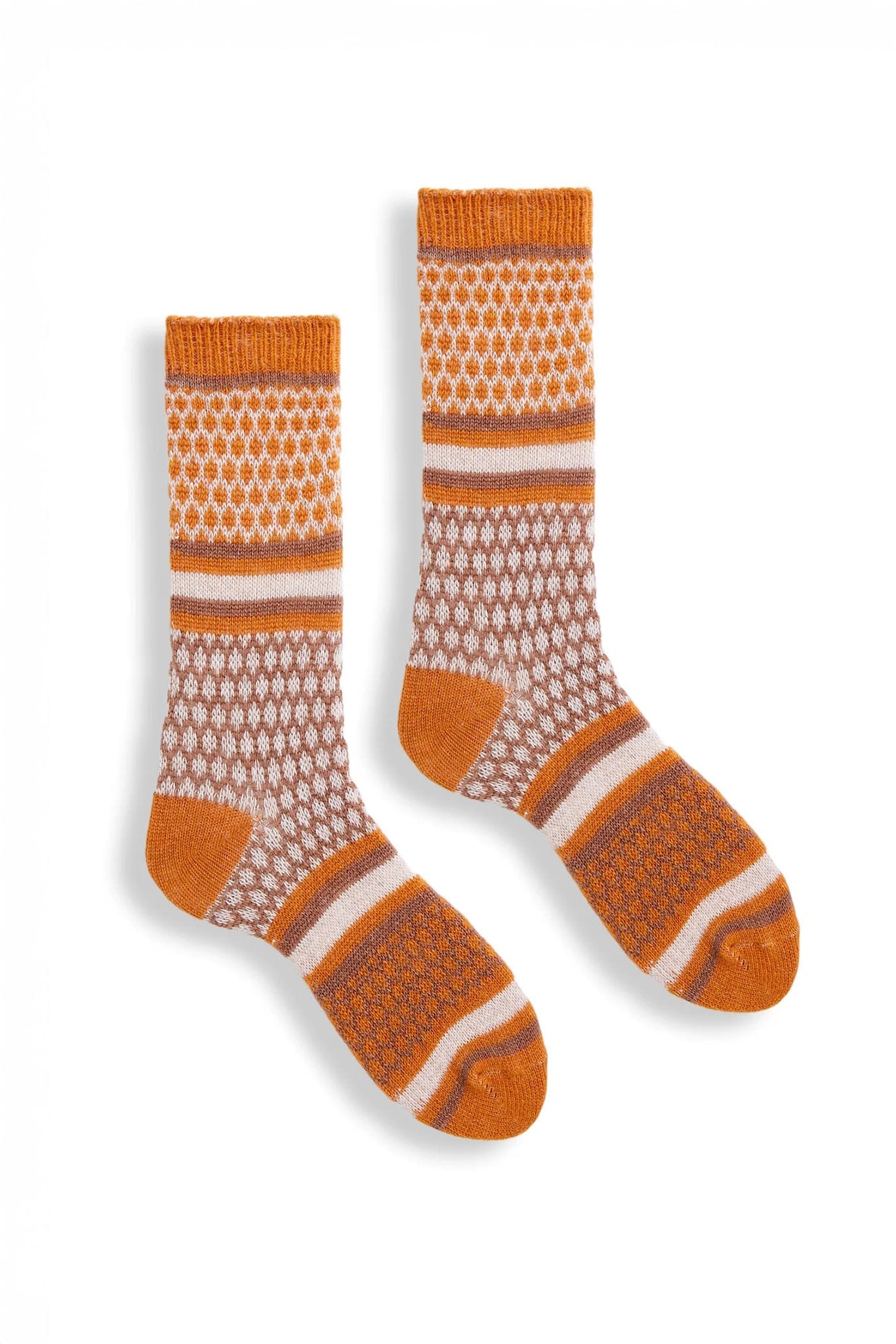 A pair of honeycomb patterned wool socks in orange and beige colors.
