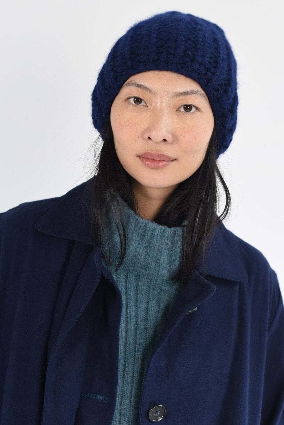 Woman wearing a chunky knit beanie
