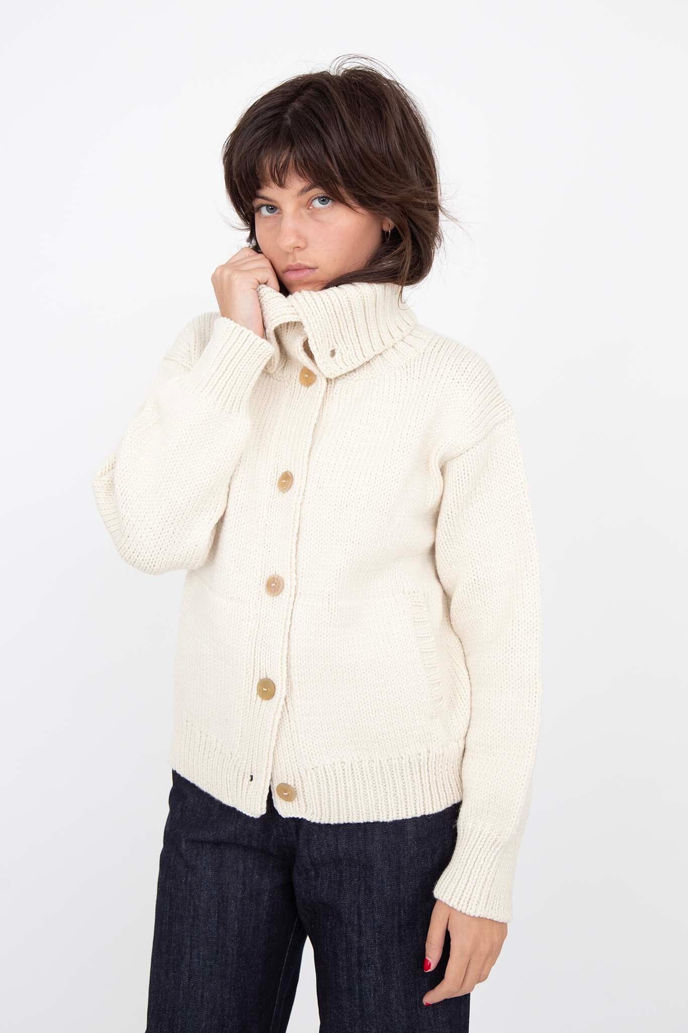 Textured, funnelneck wool cream cardigan. Designed by M.Patmos in Brooklyn New York.
