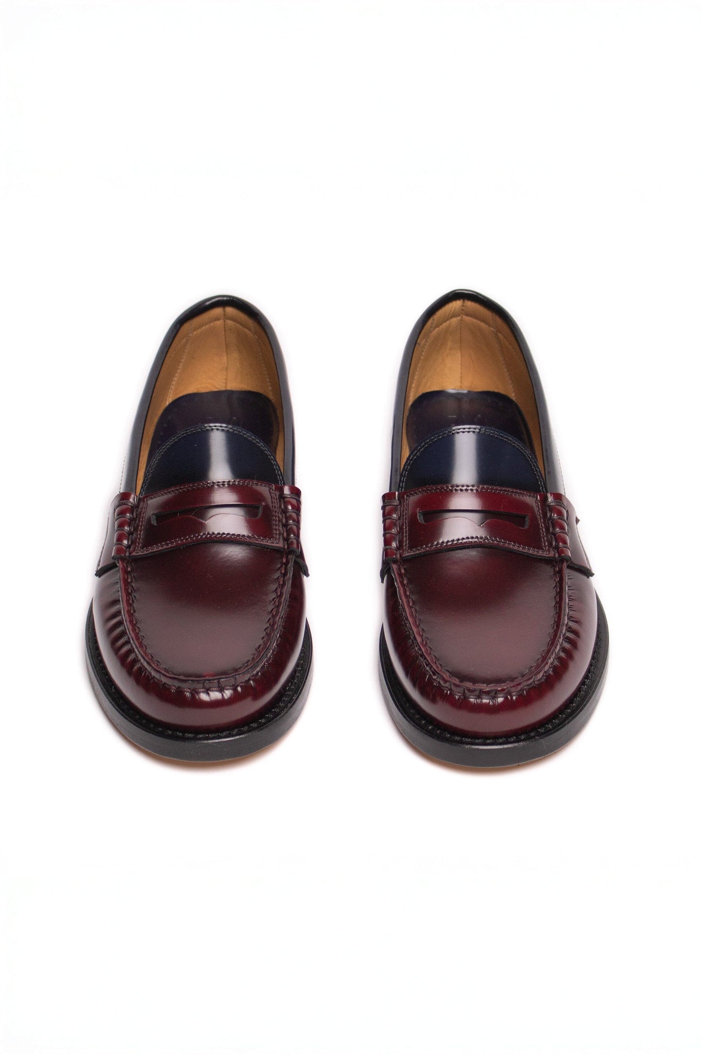 Leather penny loafers in a maroon and navy color