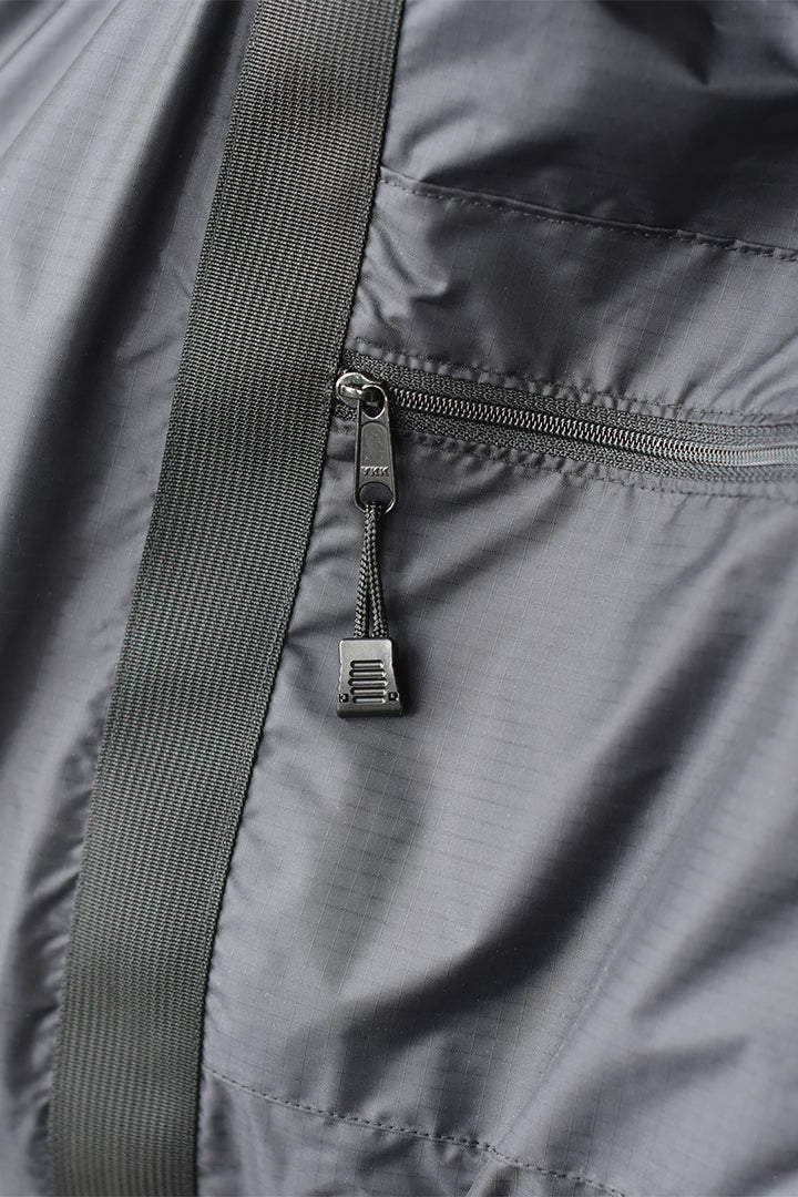 A close up of the 8.6.4. nylon zipper tote