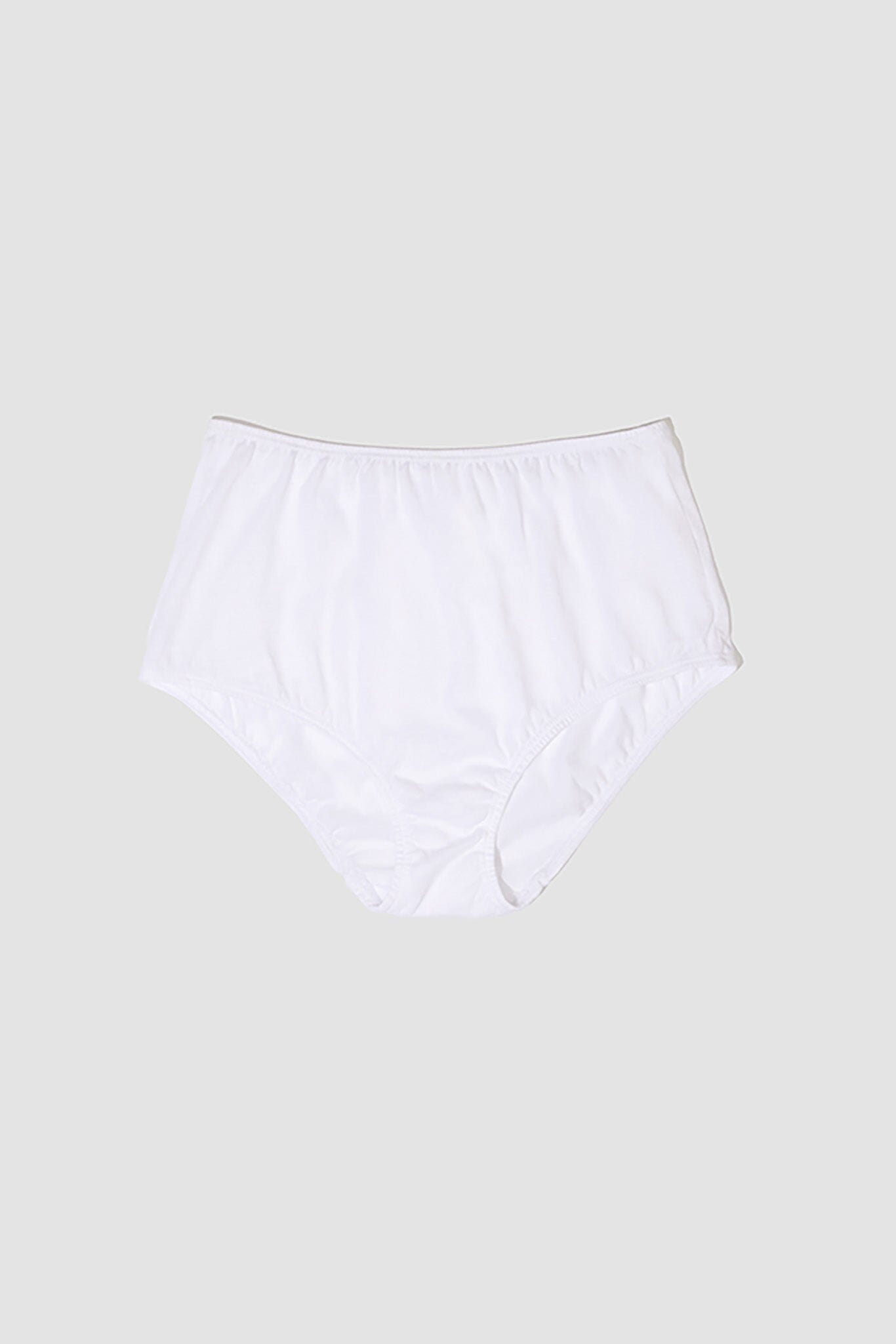A mid-rise white brief underwear on a plain background.