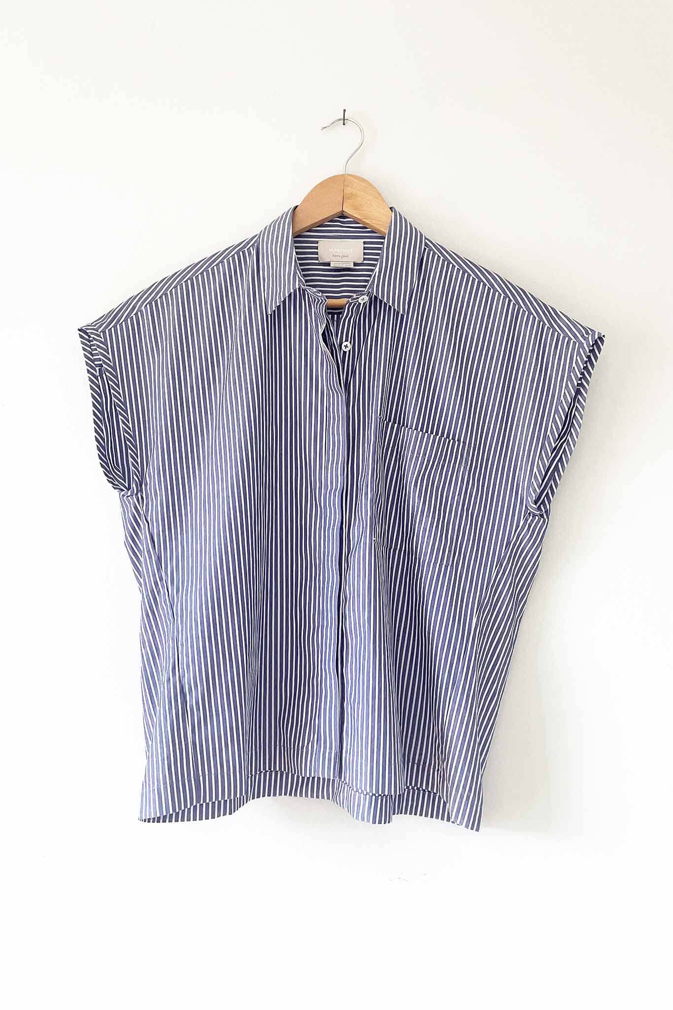 Best summer top. Sleeveless button down cotton shirt.