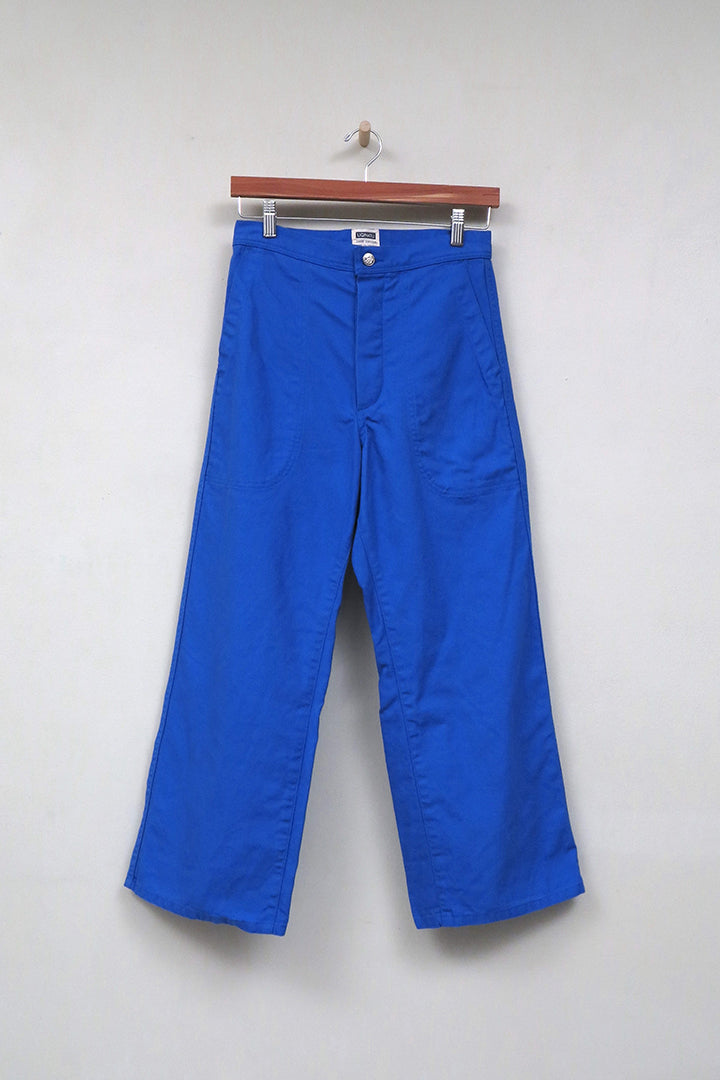 A flat shot of UQNATU cobalt blue high-rise wide-leg crop sailor pants