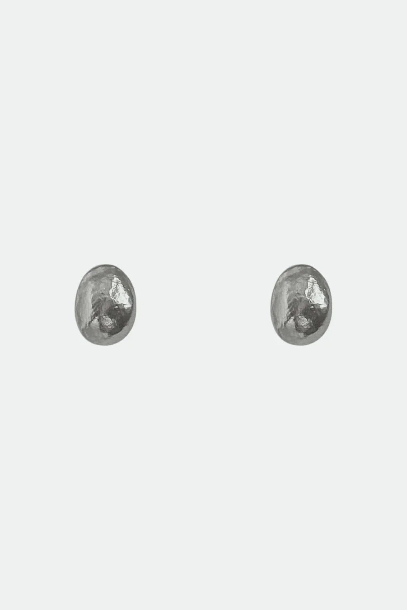 Pair of silver dome stud earrings on a white background
