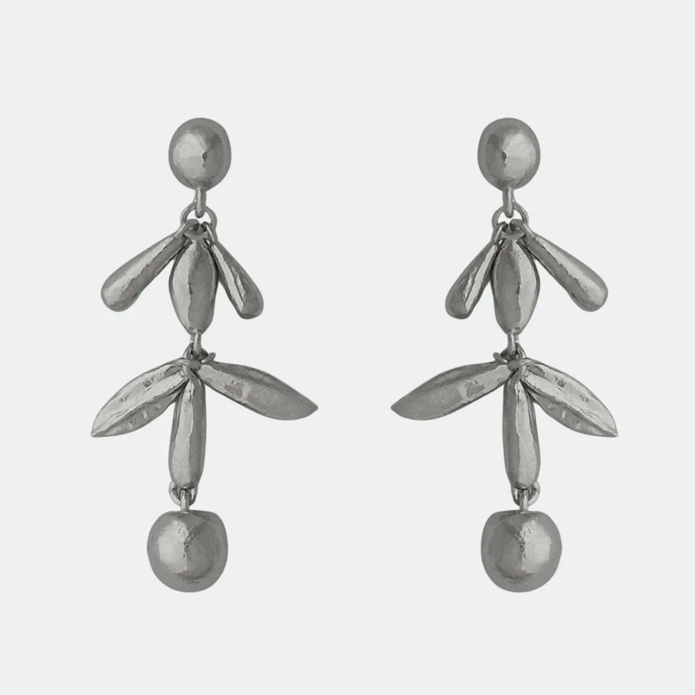 Pair of silver drop earrings with leaf-like designs on a white background