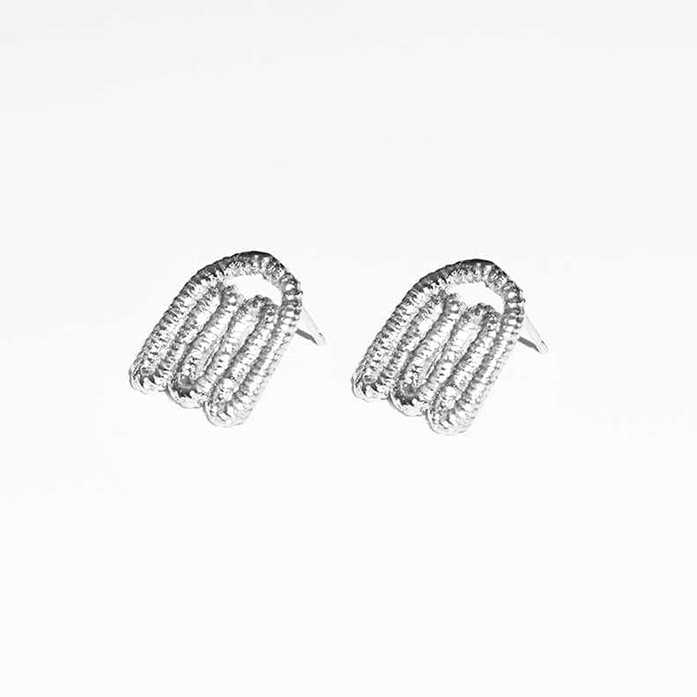 Silver layer earrings by COG at M.Patmos in Brooklyn.