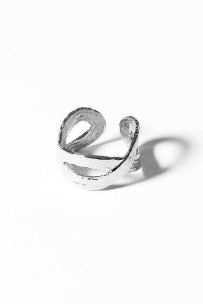 Sterling Silver loop ring by Cog. Available at M.Patmos.