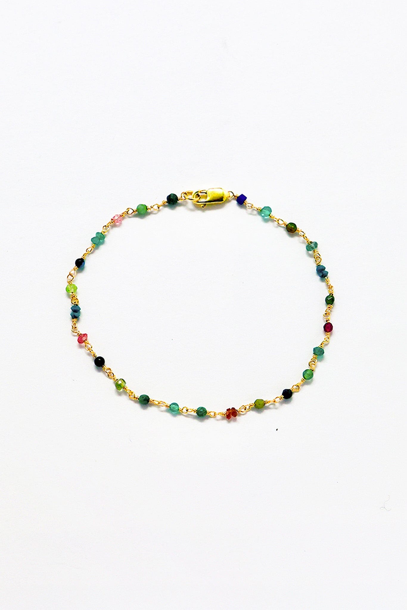 Playful, colorful everyday gemstone bracelet featuring colorful briolettes on 14k gold filled wire. The perfect gift. Available as M.Patmos in Brooklyn.