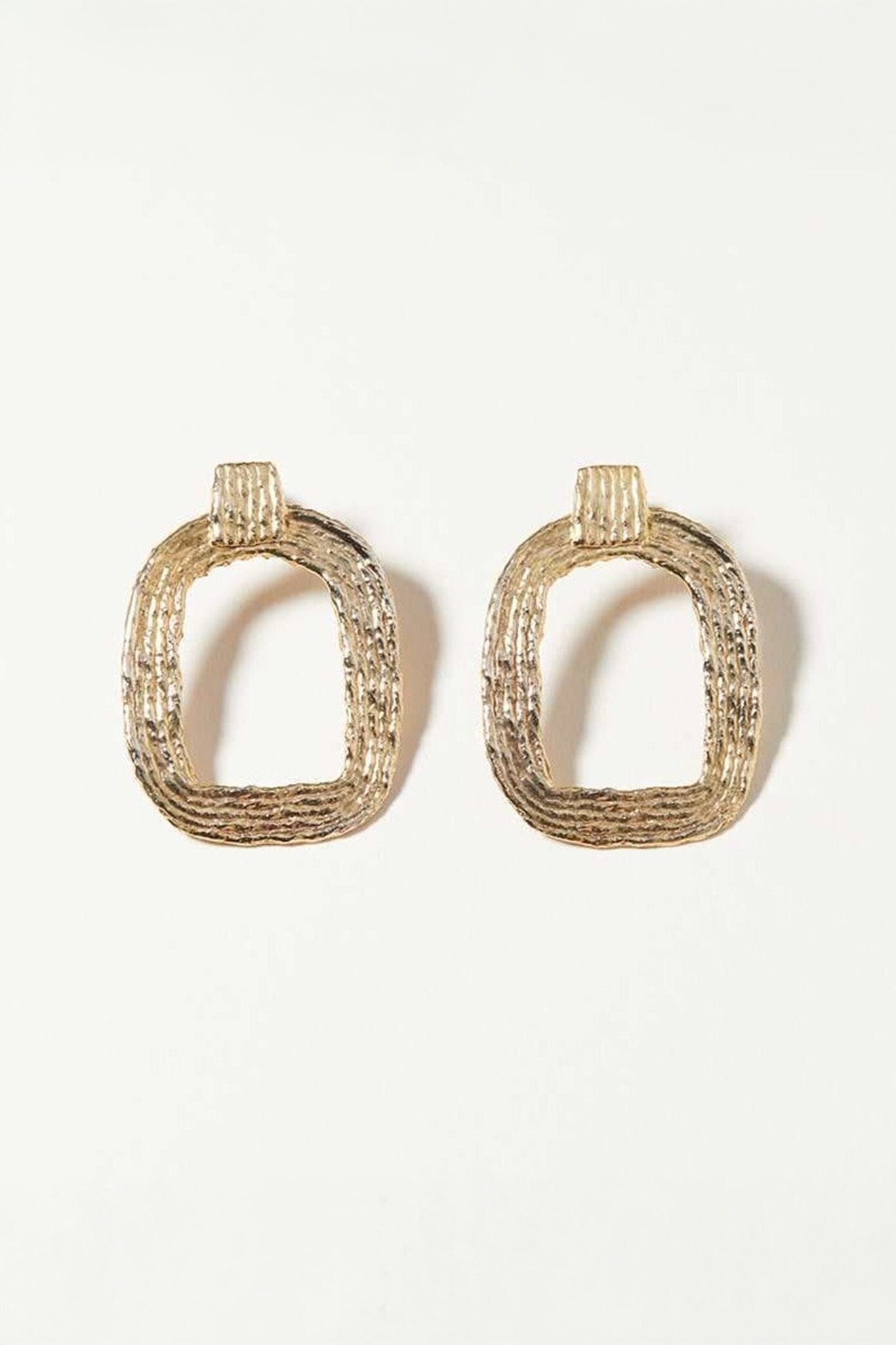 Gold, textured Eva hoops by COG at M.Patmos in Brooklyn