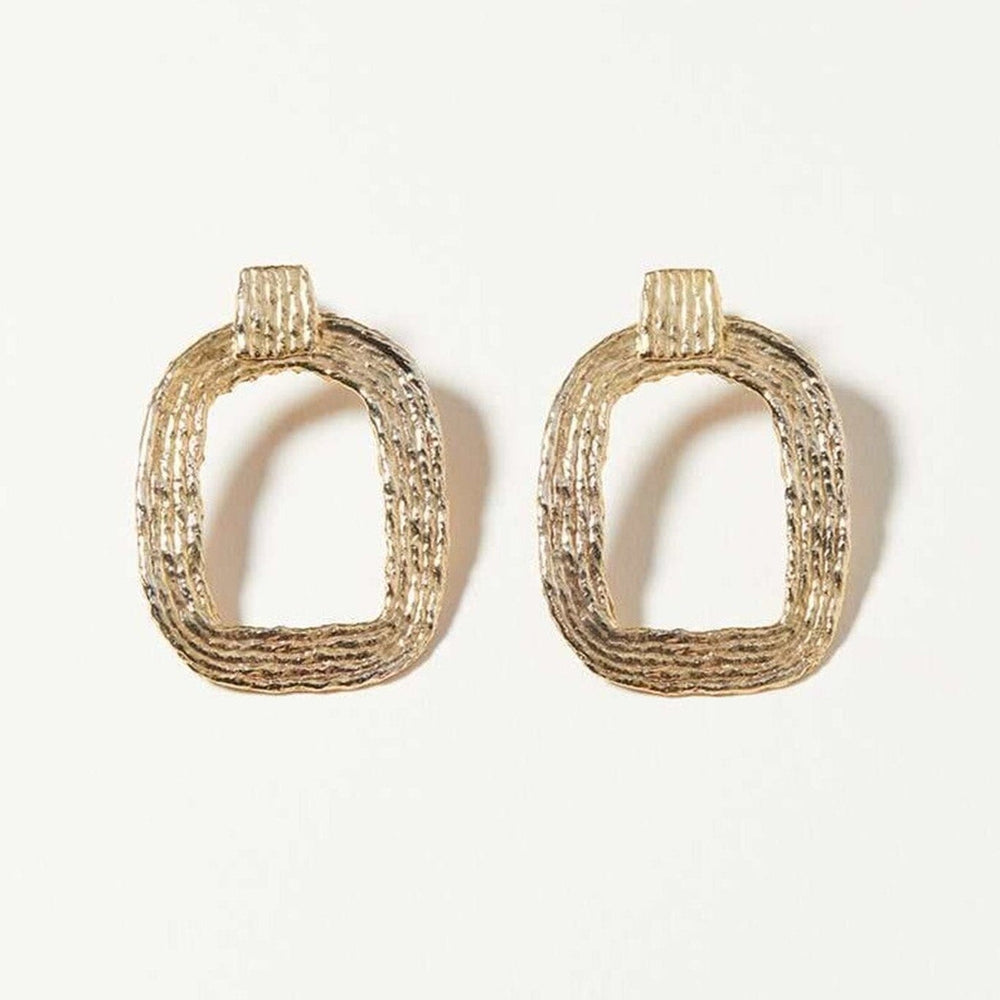 Gold, textured Eva hoops by COG at M.Patmos in Brooklyn