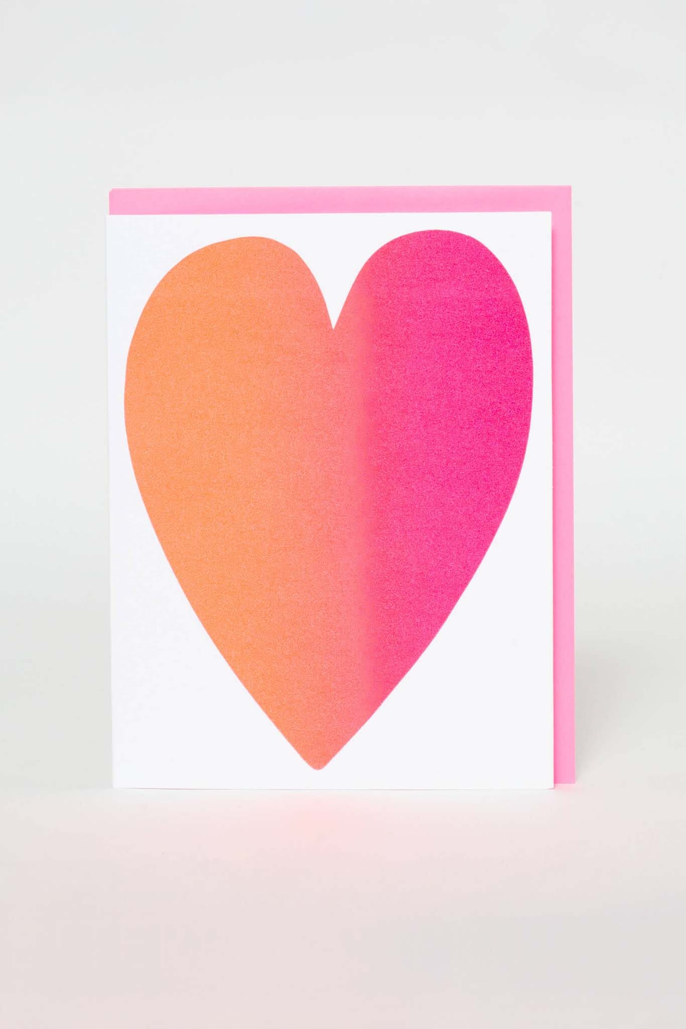 Heart-shaped card with pink and orange gradient on a white background