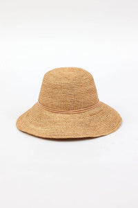 Beige crotchet bucket hat on a white background