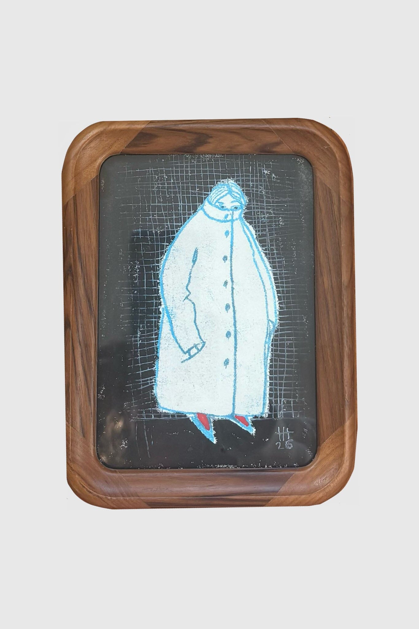Framed artwork of a person wearing a big coat on a grid background