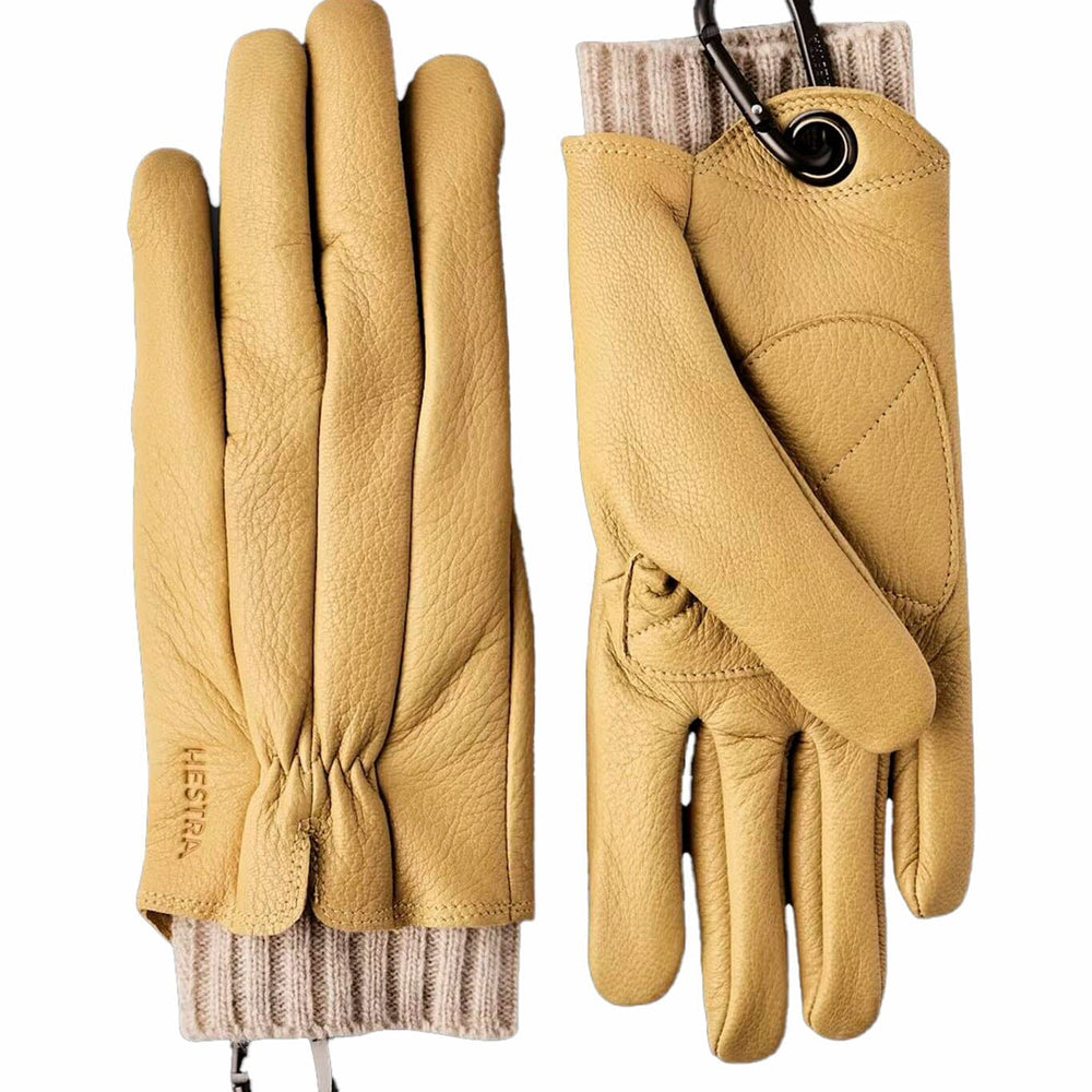 Pair of women's tan leather gloves with a carabiner on a white background