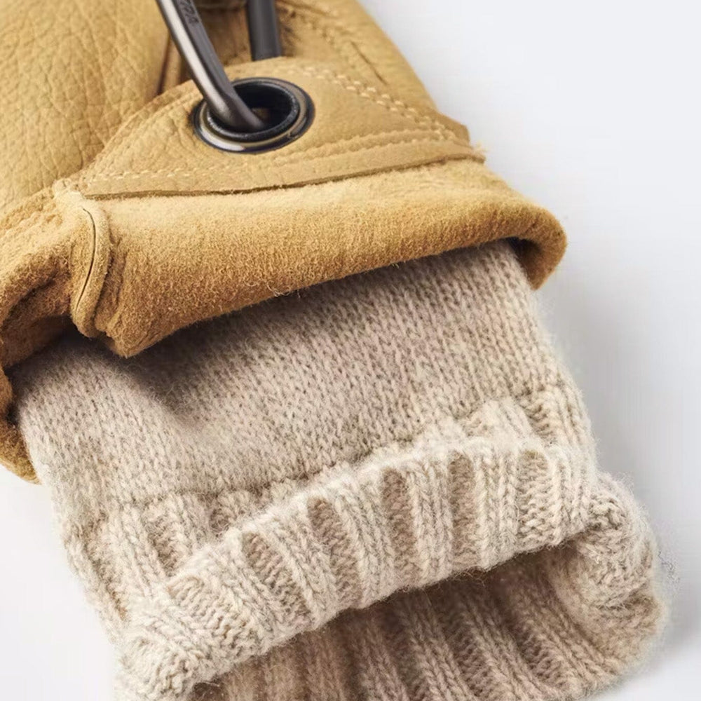 
                  
                    Tan leather gloves with a wool interior
                  
                