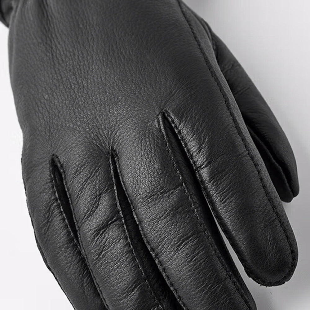 
                  
                    Black leather gloves on a white background
                  
                
