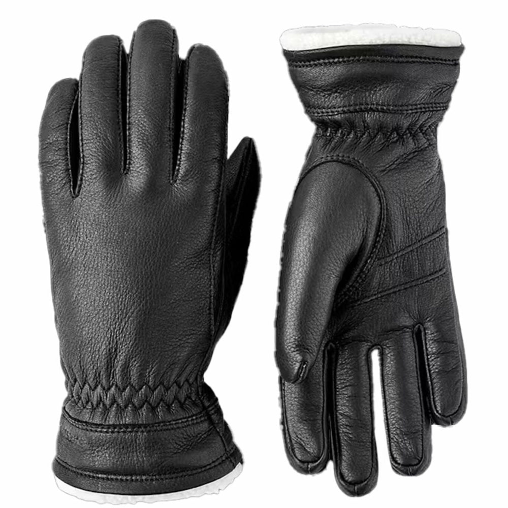 Pair of black leather gloves with insulated wool design on a white background