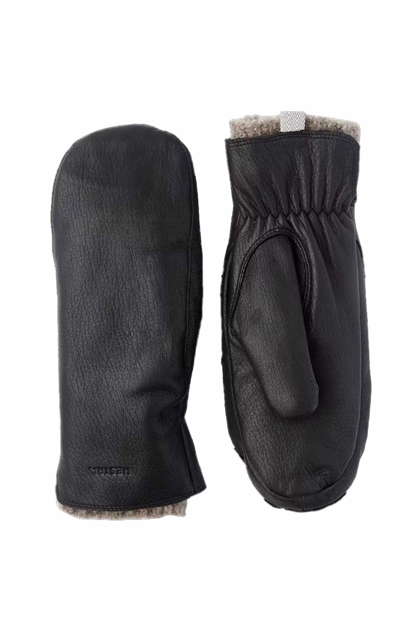 Women's black wool lined mittens on a grey background 