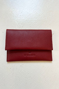 Red leather wallet on a white background