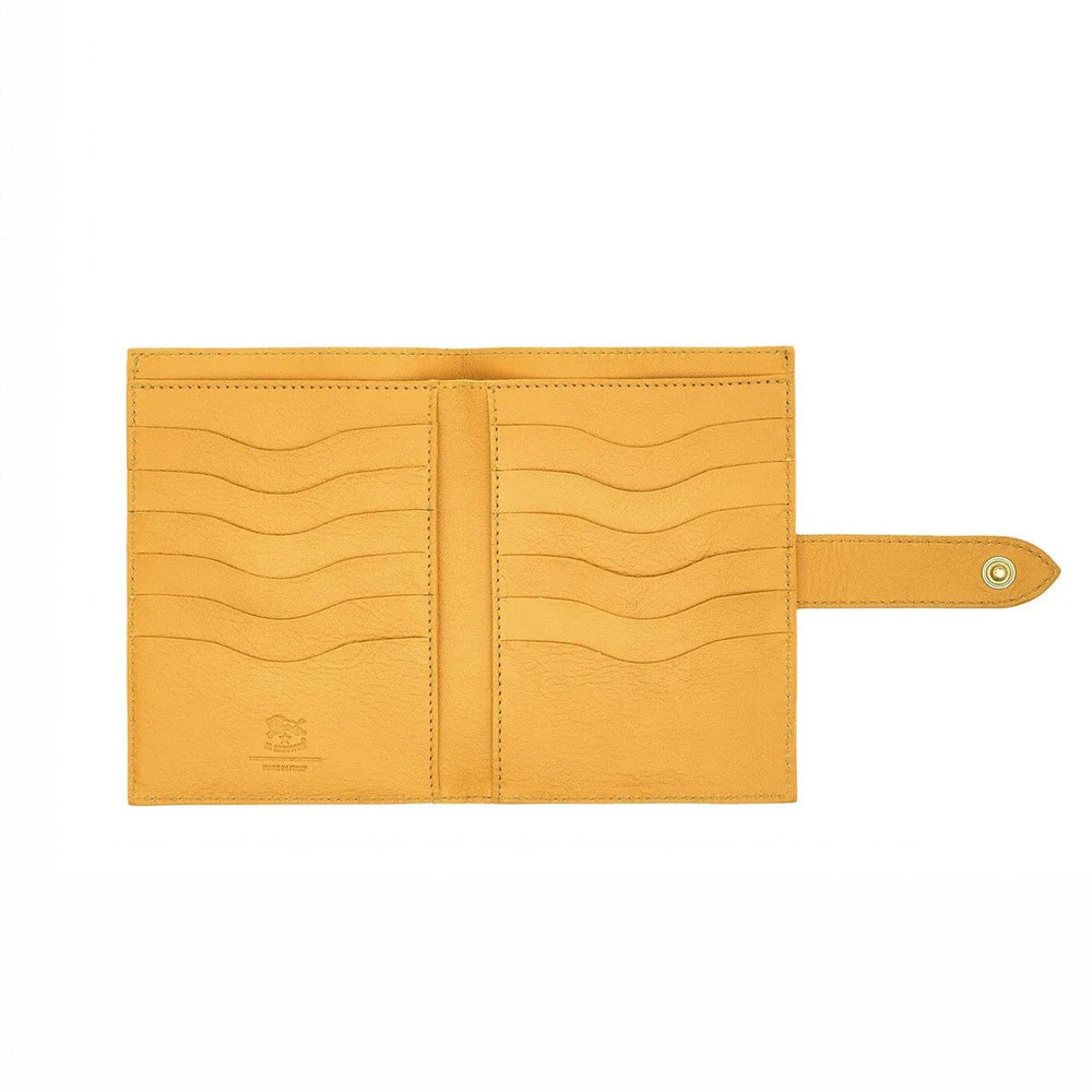 Yellow leather wallet with interior card pockets on a white background