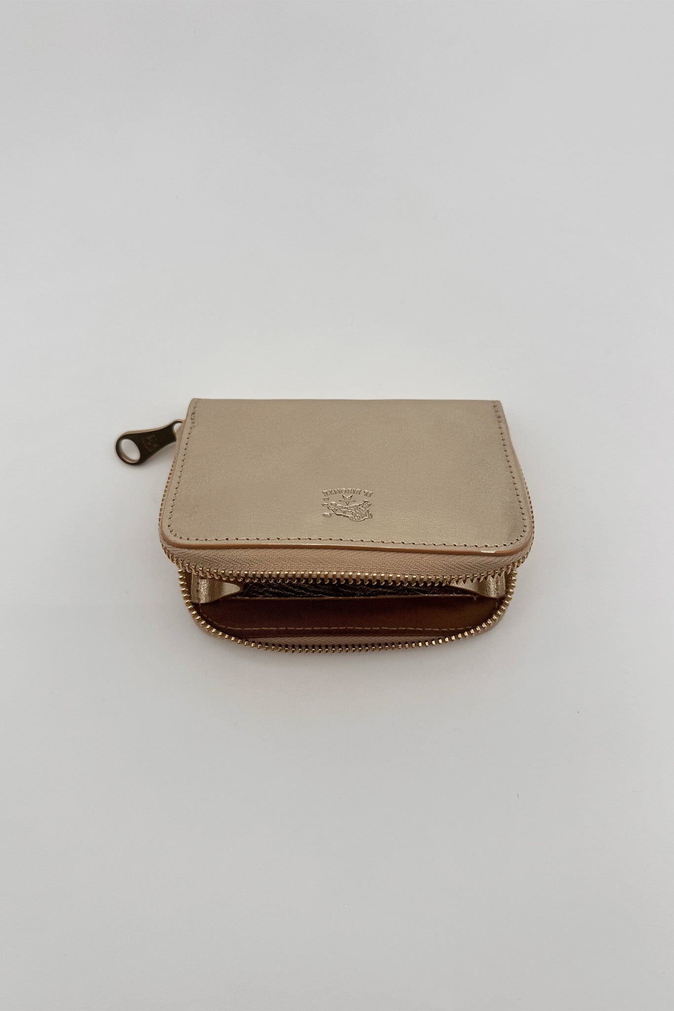 Platinum metallic wallet with a zipper on a white background
