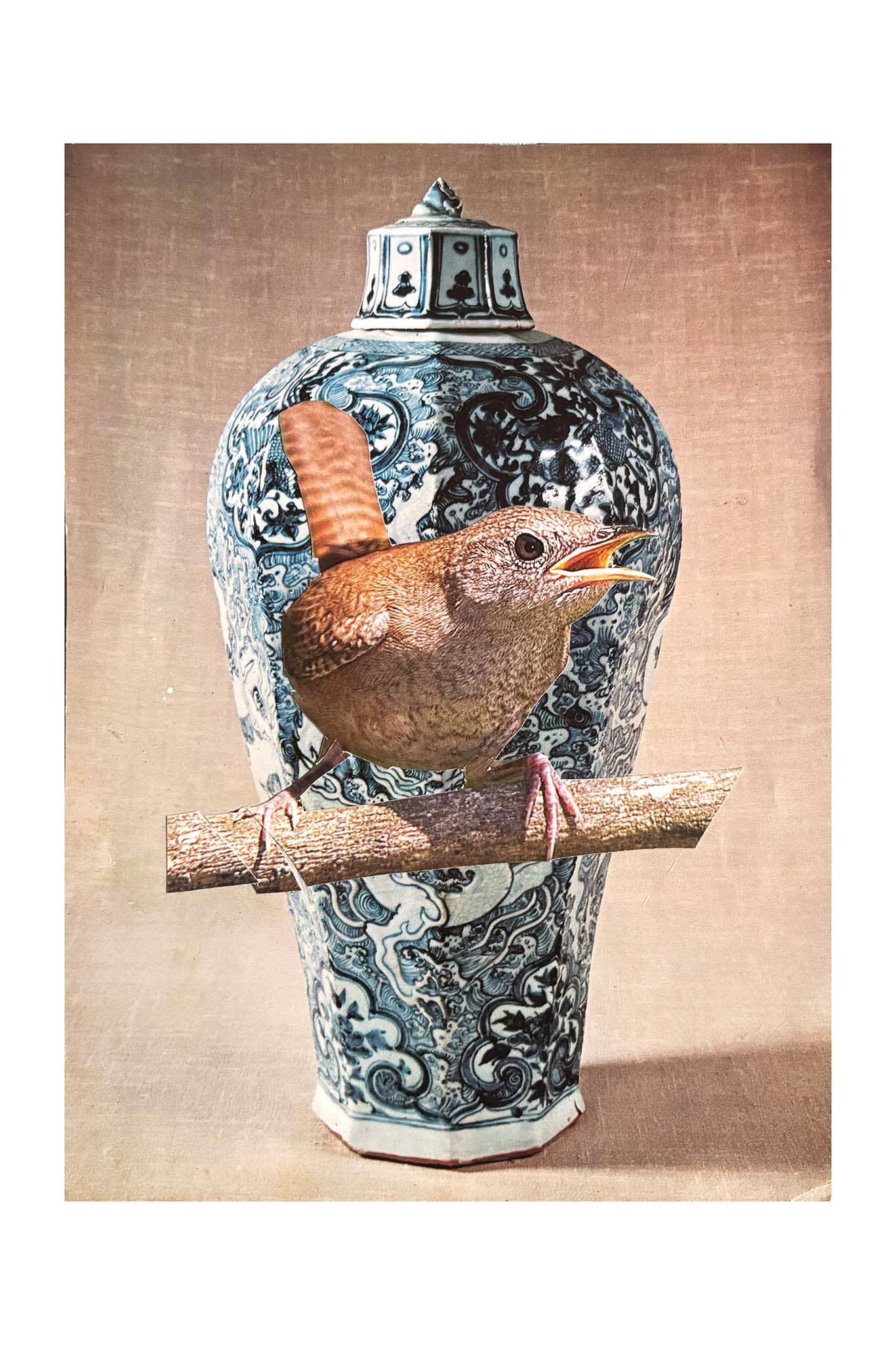 Decorative vase with intricate patterns and a bird perched on top