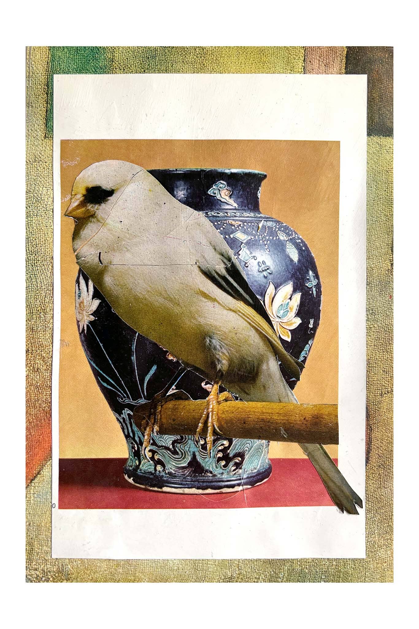Bird perched on a branch with a decorative vase in the background