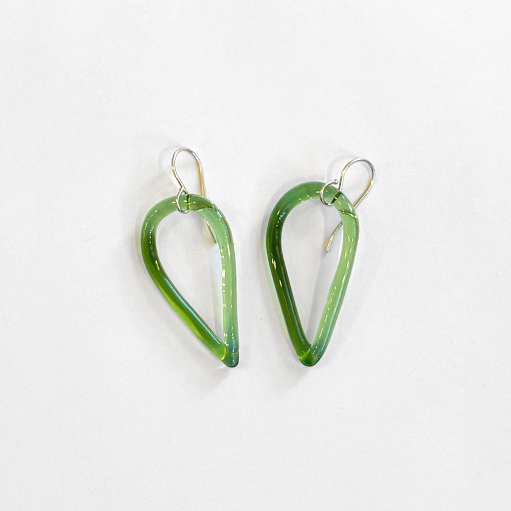 Green teardrop-shaped earrings on a white background