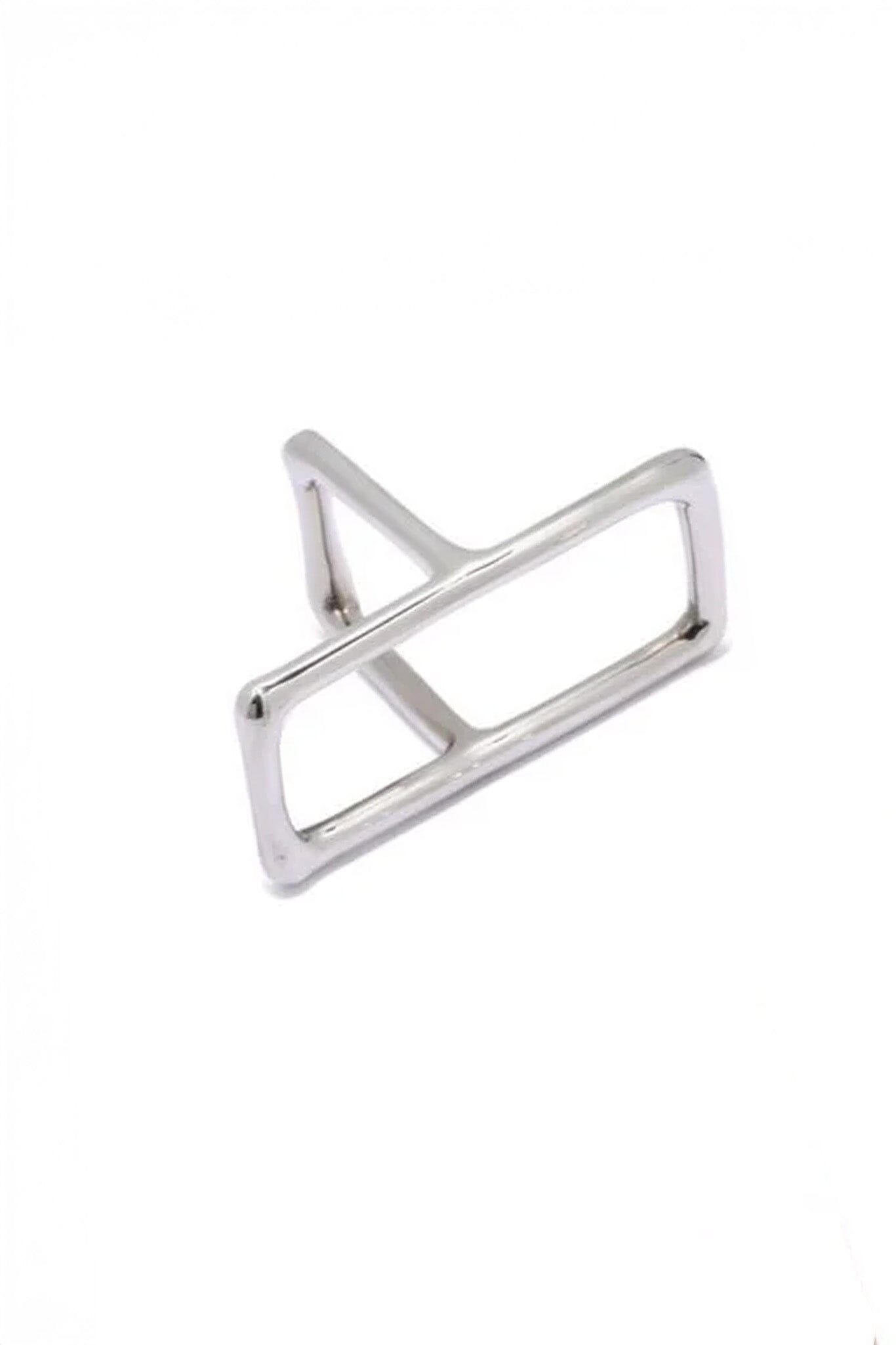 Silver geometric ring on a white background