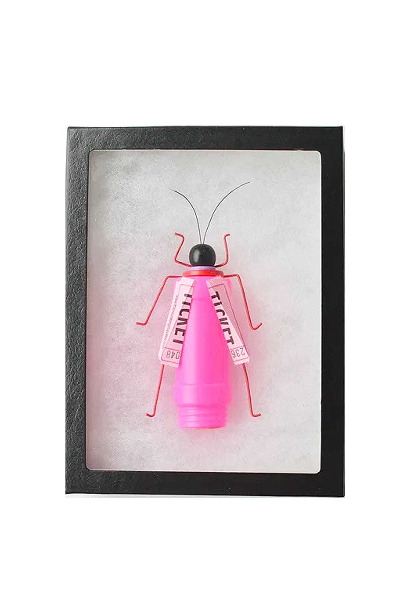 Framed artwork of a pink insect figure with ticket wings on a white background