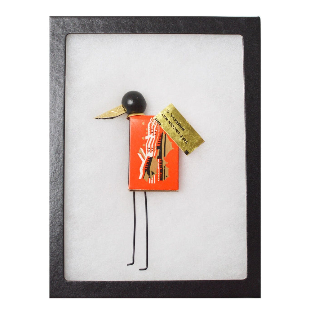 Decorative sculptural  bird with an orange box body on a white background