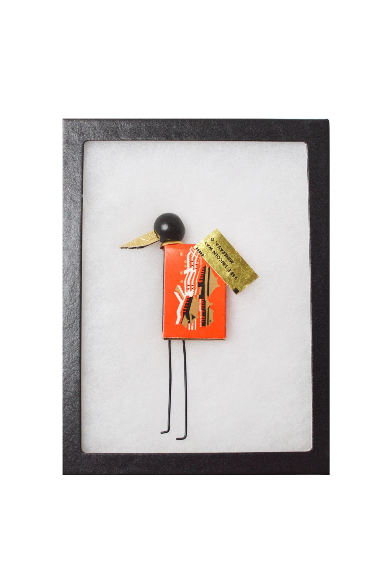 Decorative sculptural  bird with an orange box body on a white background