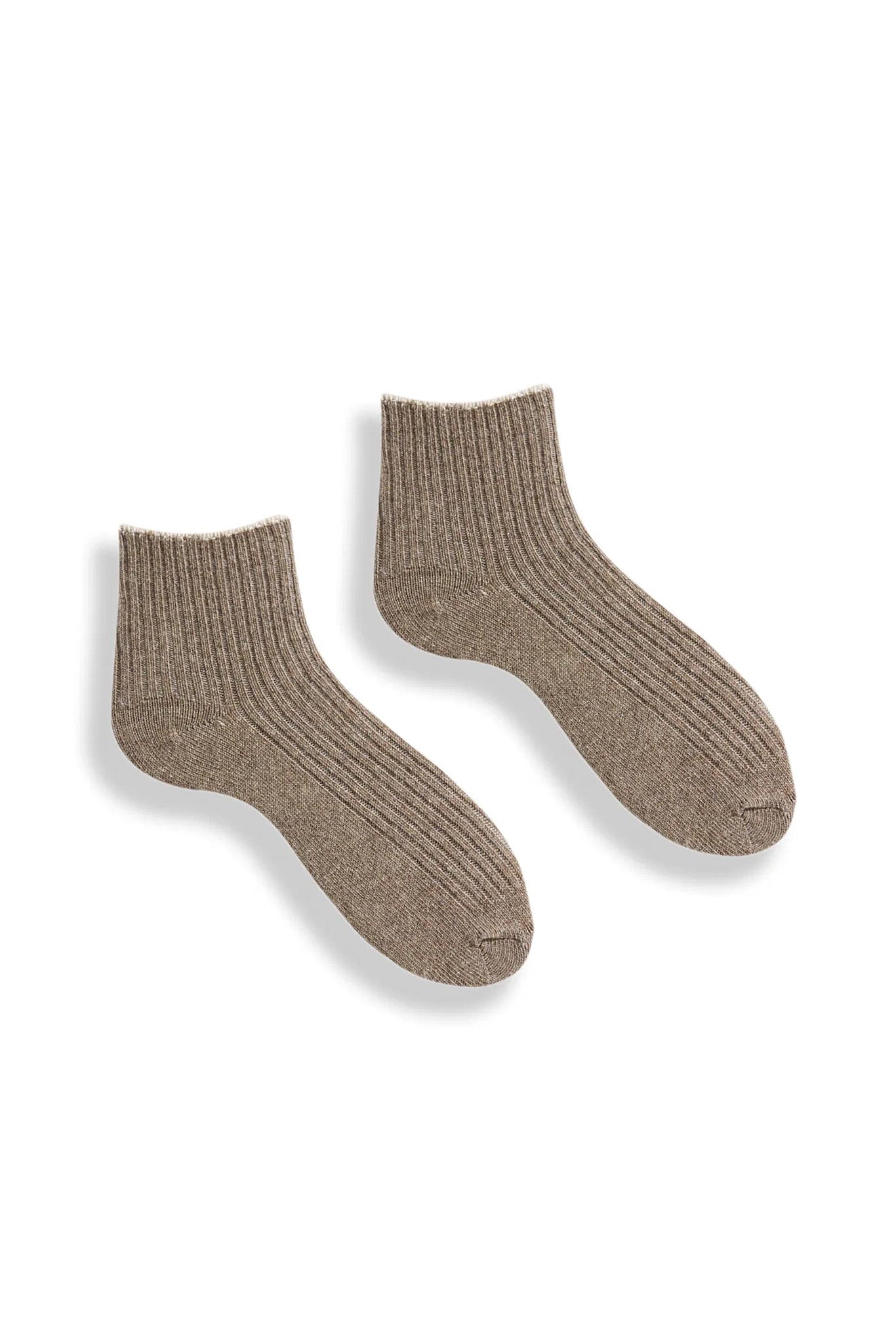 Pair of light brown cashmere and merino wool socks on a white background