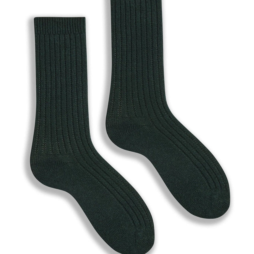 Pair of ribbed forest green socks on a white background