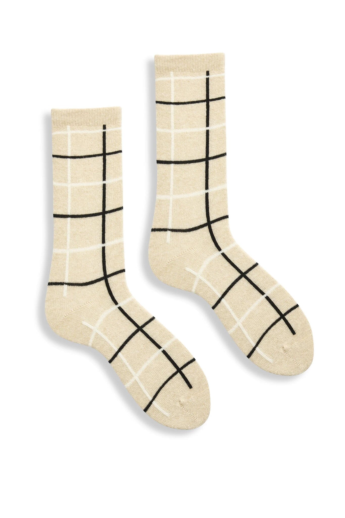 Pair of cream socks with black grid pattern on a white background