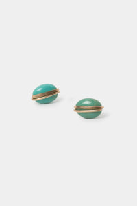 Pair of turquoise earrings with gold accents on a white background