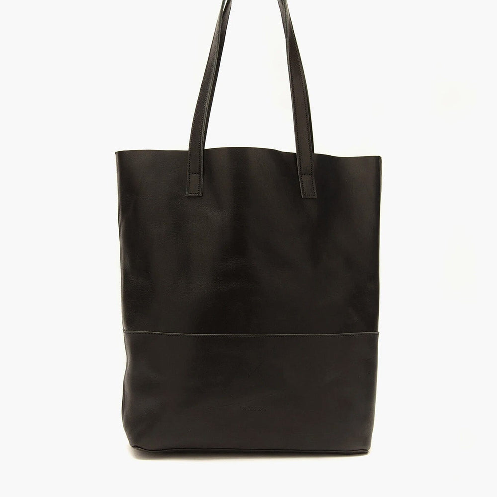 Black leather tote bag on a white background