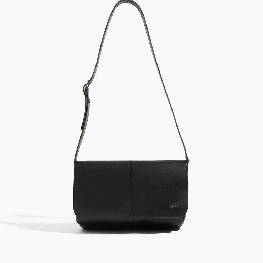 Black shoulder bag on a white background