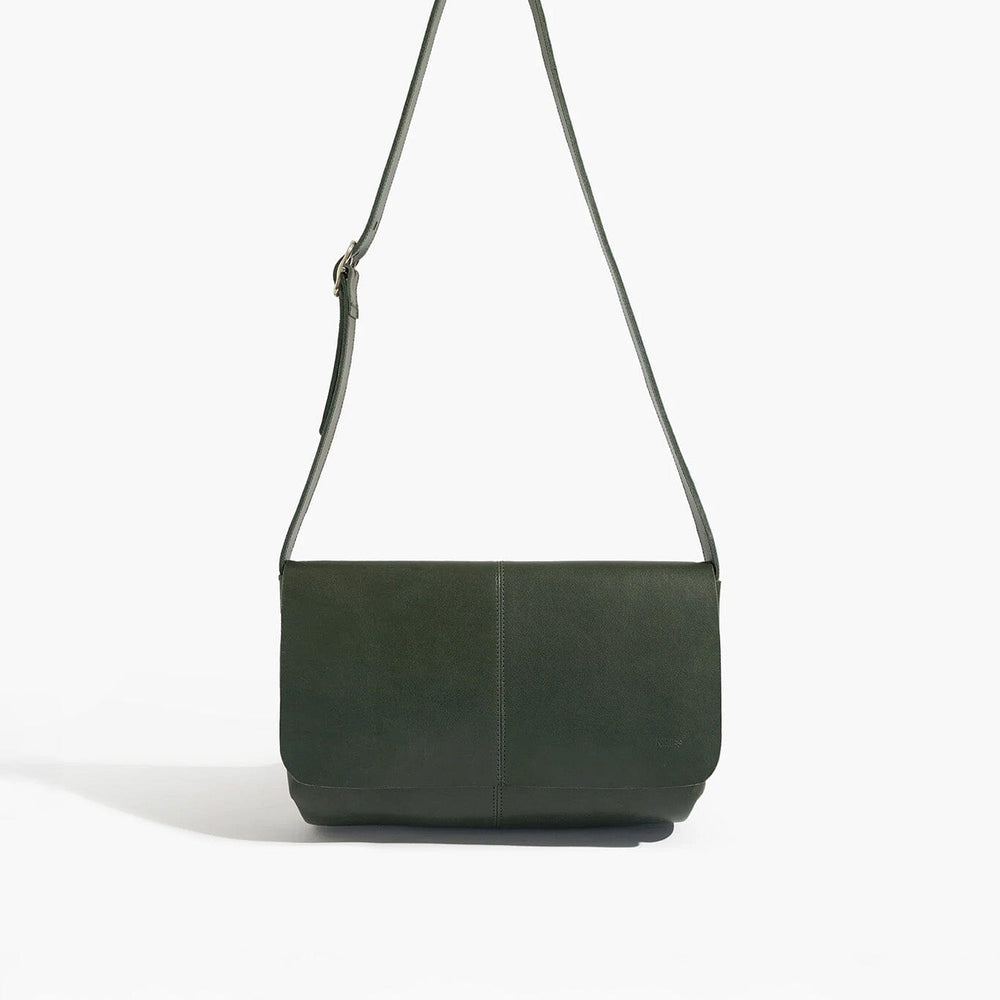 Green shoulder bag on a white background
