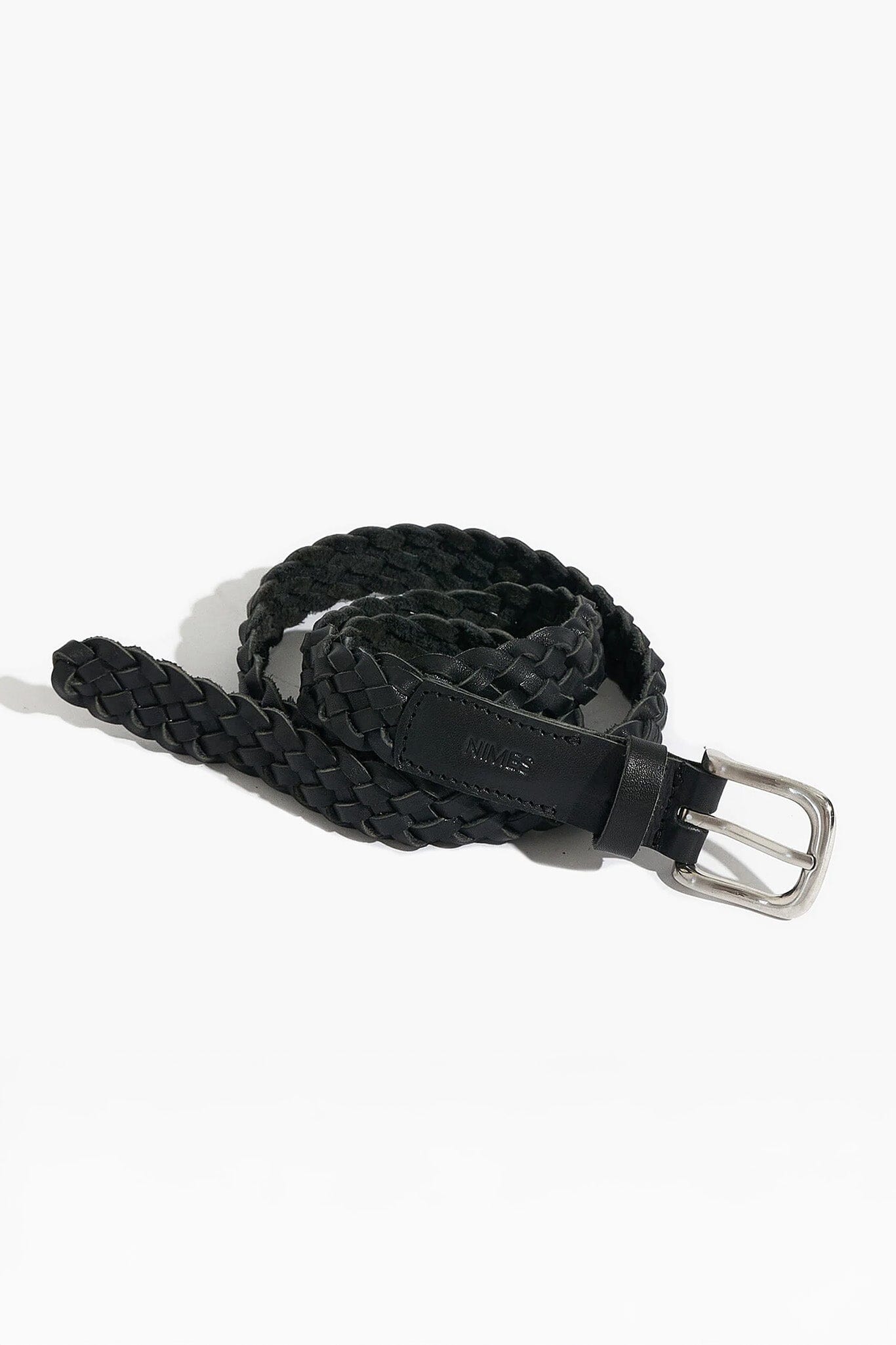 Black braided belt with a silver buckle on a white background