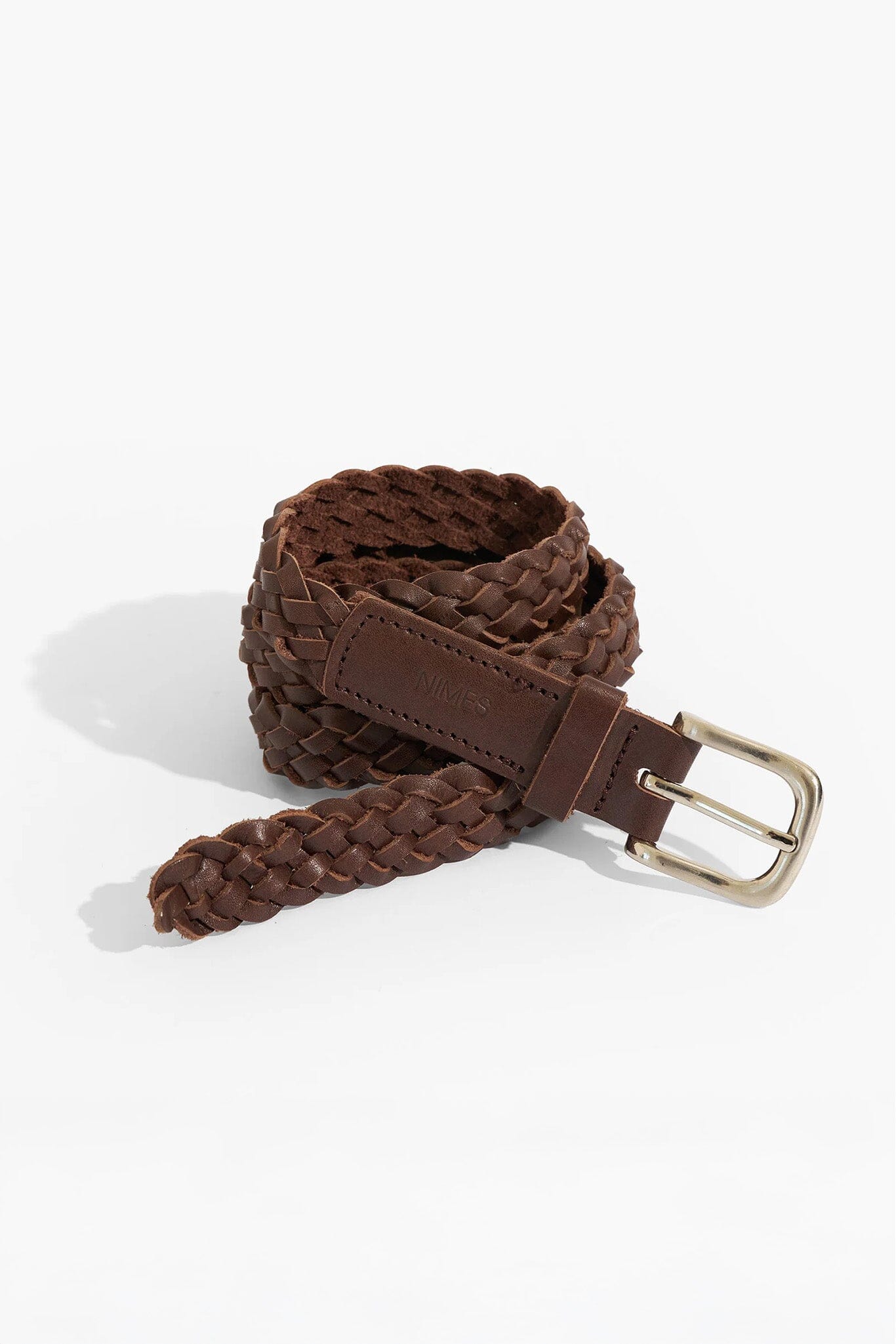Brown braided belt with a gold buckle on a white background