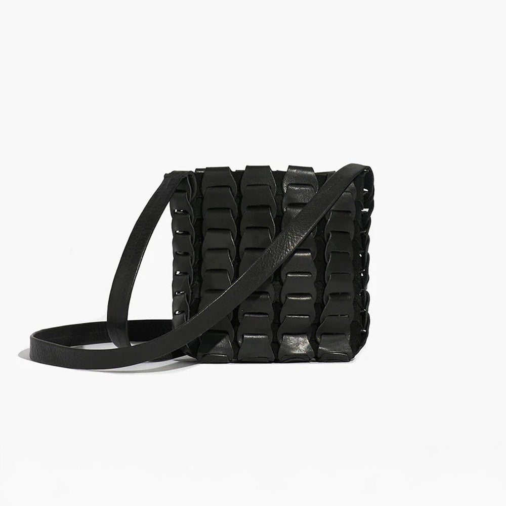 Black textured handbag with a strap on a white background