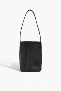 Black leather shoulder bag on a white background