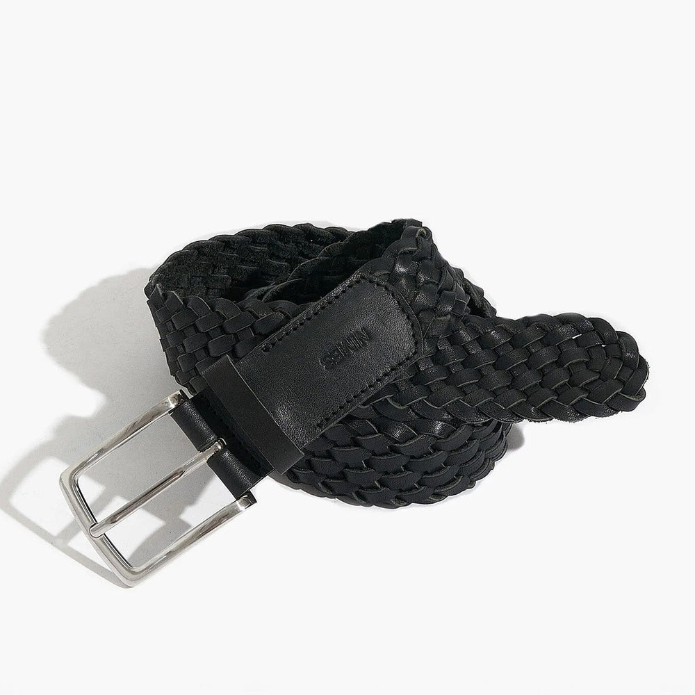 Black woven belt with a silver buckle on a white background