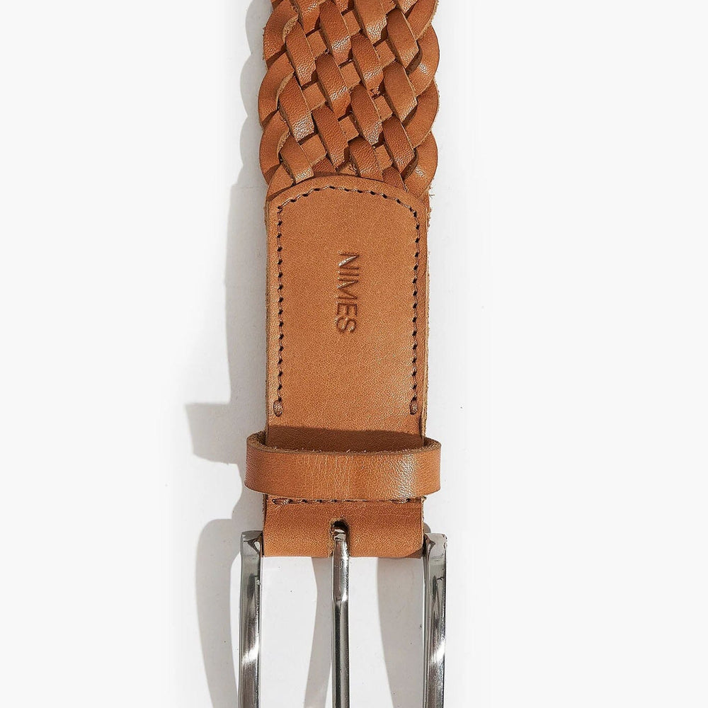 Brown braided belt with silver buckle on a white background