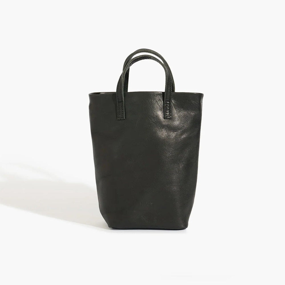 Black leather tote bag on a white background