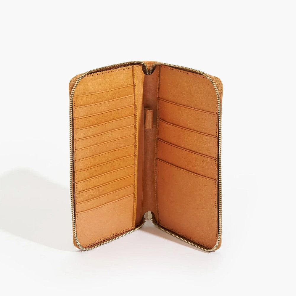 Tan leather wallet interior on a white background